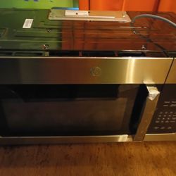 Brand New Microwave (Vented,)