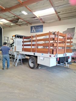 Stake Bed With Arow Board 