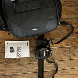 Nikon D3300 with case with 18-55mm lens