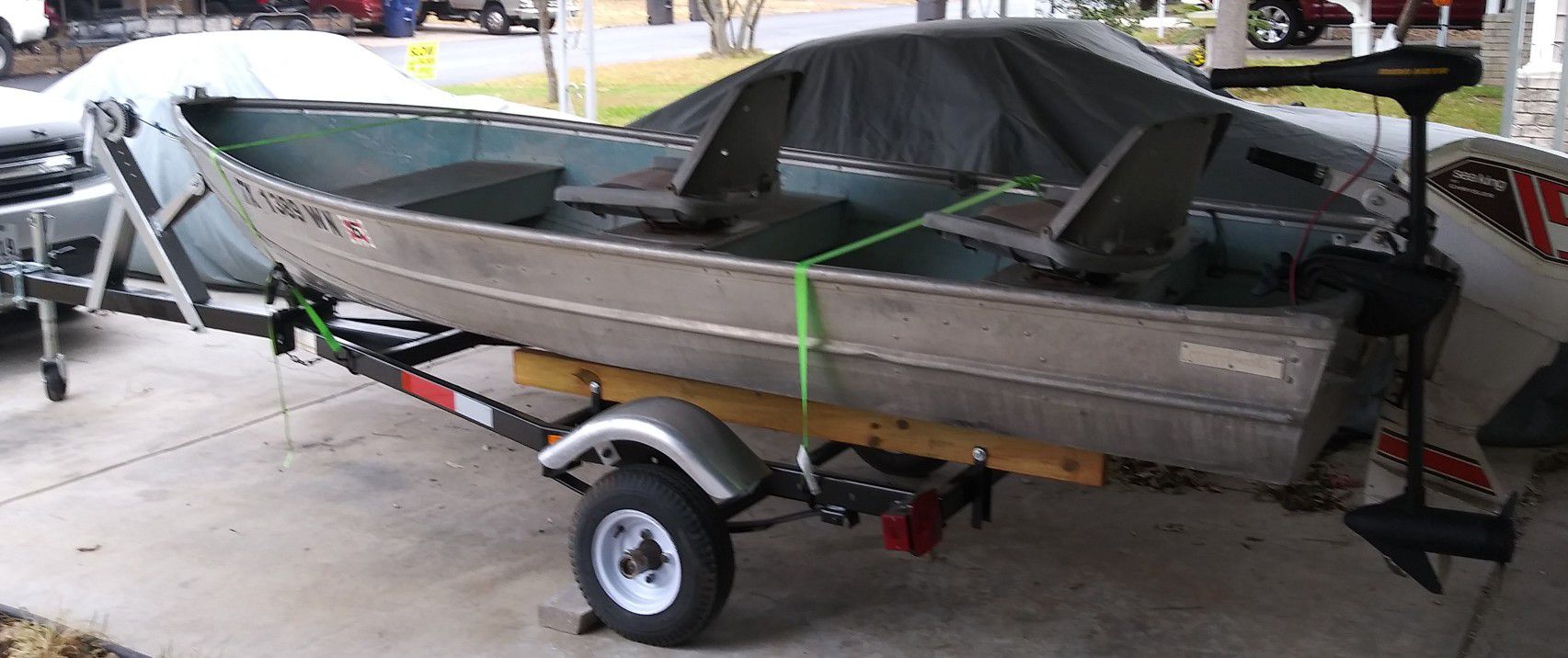Sea king 12 ft aluminum boat with motor,trolling motor and trailer