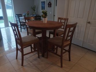 Beautiful wood dining table set with 4 chairs clean and ready to go moving sale