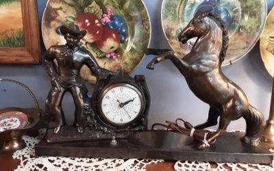 Western Cowboy Clock light- Located in Shelton