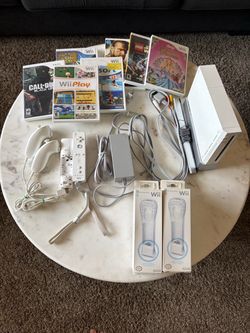 Wii game system with two controllers and games