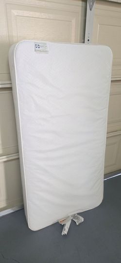 Sealy 2-Stage  Crib and Toddler Mattress Waterproof.  52"×27".