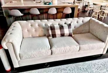 Living Spaces Chesterfield linen sofa