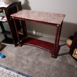 MARBLE  CONDOLE TABLE 36 INCHES WIDE AND 30 INCHES HEIGHT AND. 15 DEPTH.$40.00