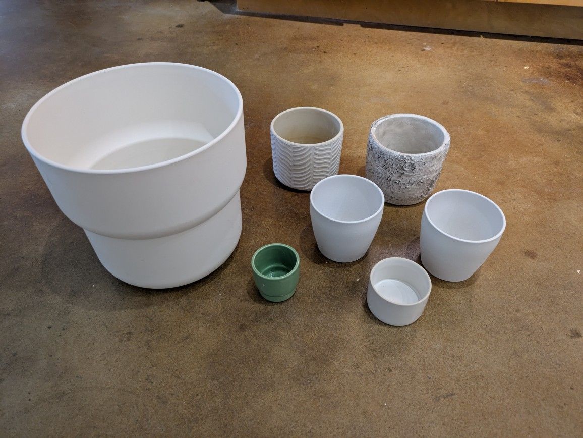 7 Plant Potters ( Different sizes)