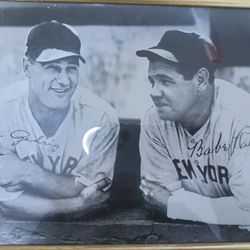 framed photograph featuring baseball legends Babe Ruth and Lou Gehrig.