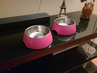 Pink cat food/water bowls