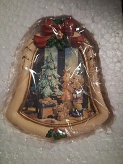 Vintage-style Christmas bell ornament featuring an adorable teddy bear holiday scene, complete with a Christmas tree and festive seasonal details. The