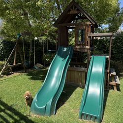 Swing Set With Slides And Rock Wall