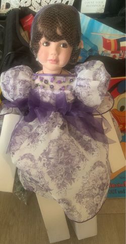 Marie Osmond porcelain doll with bench