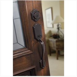 Arlington Venetian Bronze Single Cylinder Door Handleset with Tustin Door Handle Featuring SmartKey Security