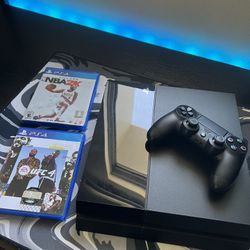 PS4 + Controller + 2 Games