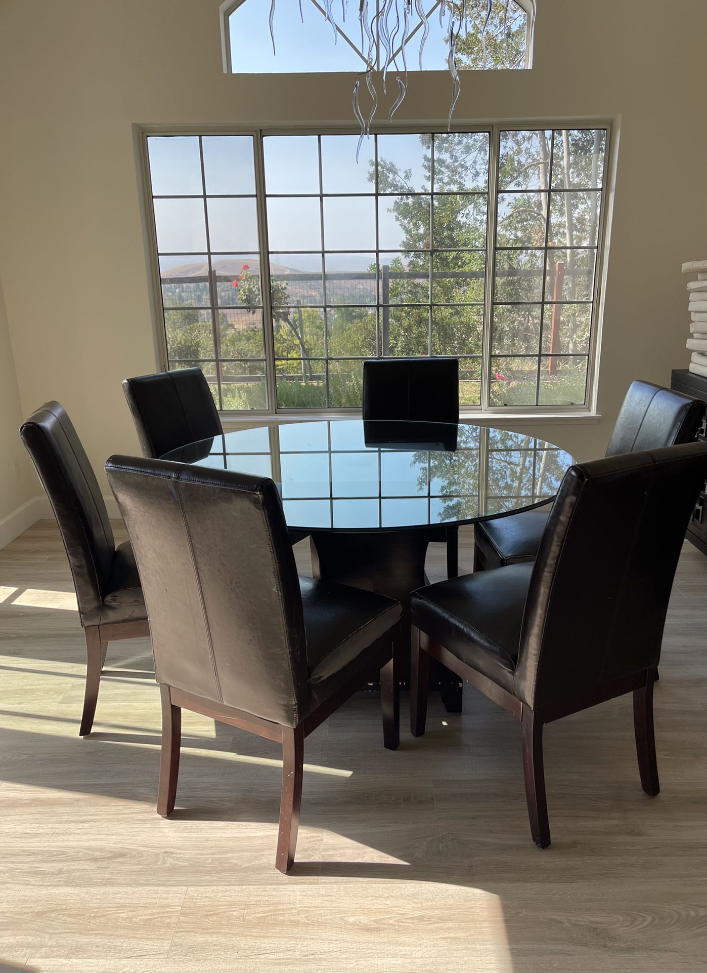 Glass Table With 6 Leather Chairs