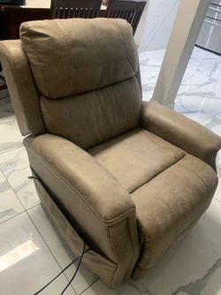 Recliner with heated seats and elevation settings