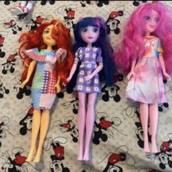 7 Mixed Dolls 