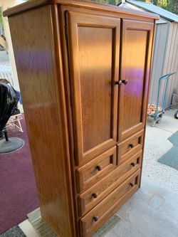 Vintage solid oak armoire by Thomasville