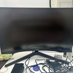 Samsung monitor with Dockleck USB‑C to DisplayPort adapter.