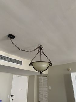 Ceiling dining room fixture in oil rubbed bronze Beauty etched globe. 19 1/2 “ round