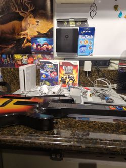 Nintendo Wii Bundle With Mario Galaxy and Guitar Hero
