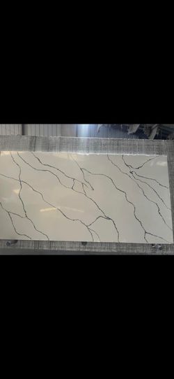 Granite Quartz countertops Material fabrication and install 50 dollars per square foot