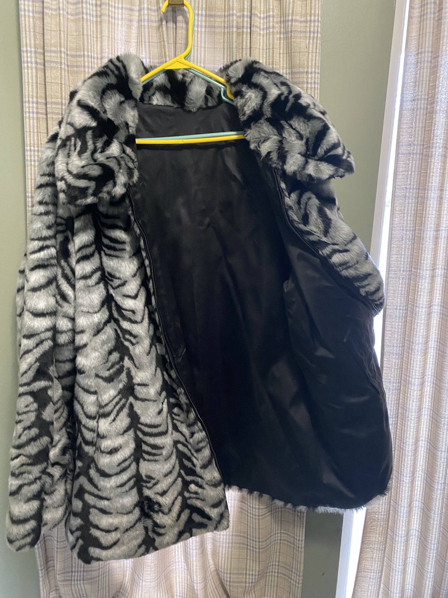 Woman’s Faux Fur Dennis Basso Coats