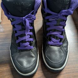 Nike black and purple shoes.  Size 9