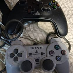 Xbox One Contrtoler And A Sony Playstation Controller 