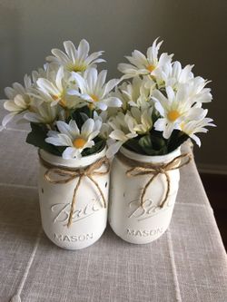 Distressed mason jar vases with silk flowers included! $12 for both