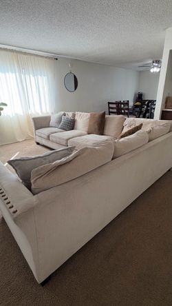Large Beige Sectional Sofa with Nailhead Trim