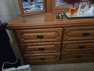 Beautiful 9 drawer oak dresser with  georgeous beveled 3 piece mirror
