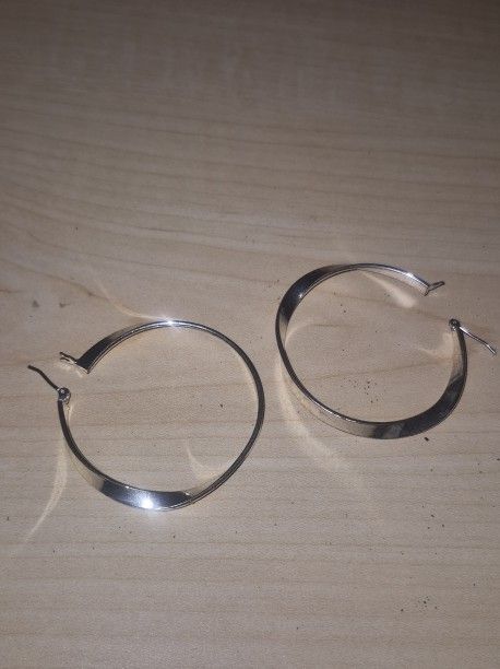 Woman's Silver Ear Rings