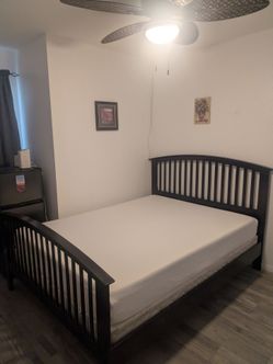 Queen bed with frame and mattress