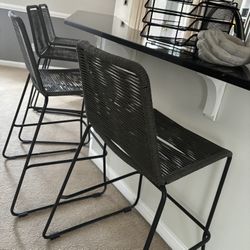 Set Of Four Black Woven Barstools 