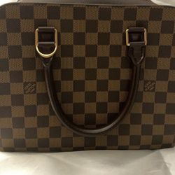 Louis Vuitton Triana Leather Handbag