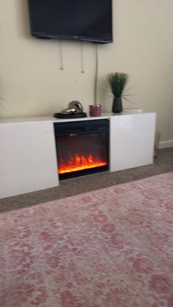 entertainment center with fireplace