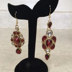 Asymmetrical Earrings (Asymmetrical is different sizes or shapes, still part of a coordinated design concept.)