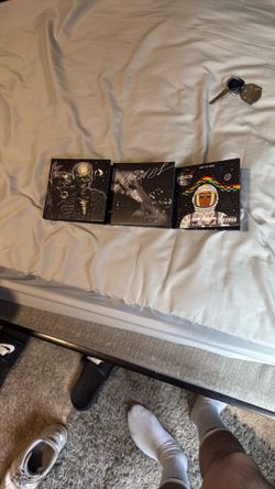 Mini vinyls  kid cudi , Rihanna , idk who the other artist is