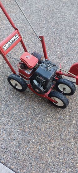 Snapper walk behind lawn edger. Works great