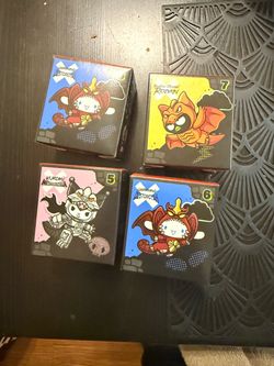 McDonald’s hello kitty x Godzilla toys