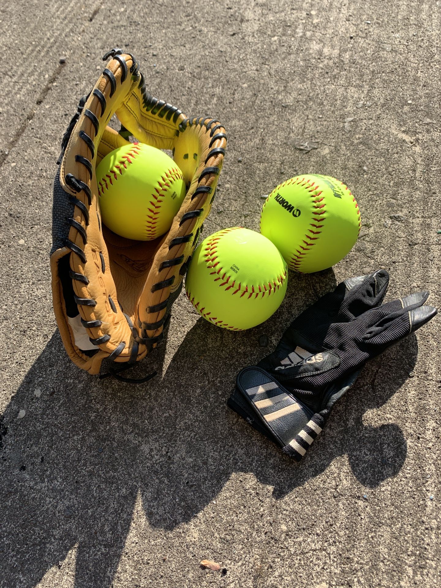 Softball glove and Balls