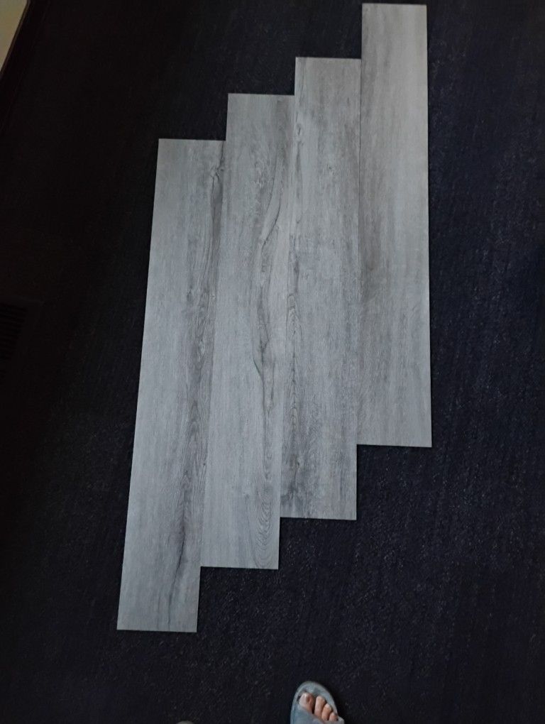 Luxury vinyl tile .95 Cents a S.F. - TOTAL S.F 126 - TOTAL PRICE $120.00