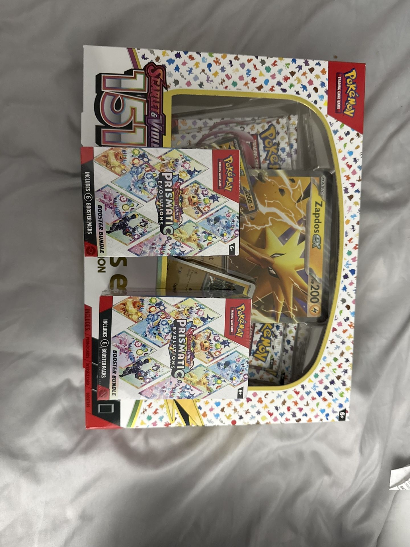 Pokemon Prismatic Evolution Booster Bundles & 151 Zapdos Box 