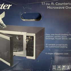 New Oster microwave - Never Opened 