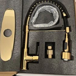 Elegant & Versatile: Gold Pull-Down Kitchen Faucet with Commercial Style and Deck Plate Transform your kitchen into a luxurious and highly functional 