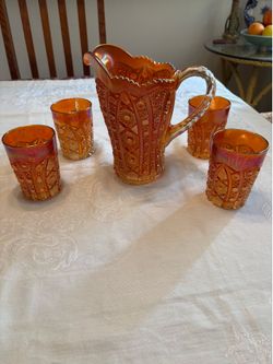 Marigold Carnival Glass Pitcher and 4 Glasses