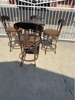 Tall barstools and table set