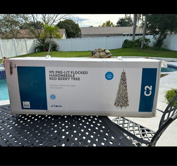 Christmas Tree - 9ft. PRE-LIT Flocked Hardneedle Red Berry Tree (Brand new in box)