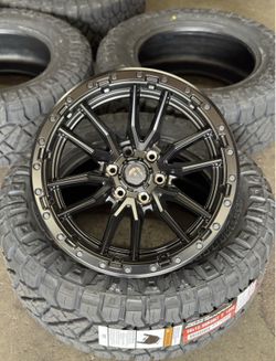 Fuel D679 Rebel 20x10 6x139.7 -18 Wheels 35x12.50R20 Nitto Ridge Grappler Tires Ram 1500 Tundra Silv